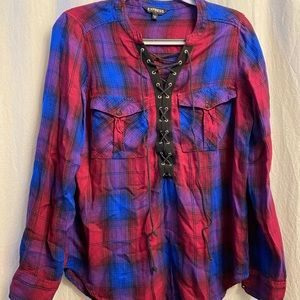 Multi colored lace up plaid long sleeve shirt.